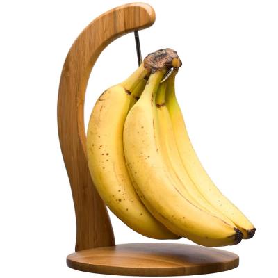 China Viable Wooden Bamboo Banana Hanger Holder Rack Keep Your Bananas Fresh Longest Yet With Creative Metal Hook Display Rack for sale