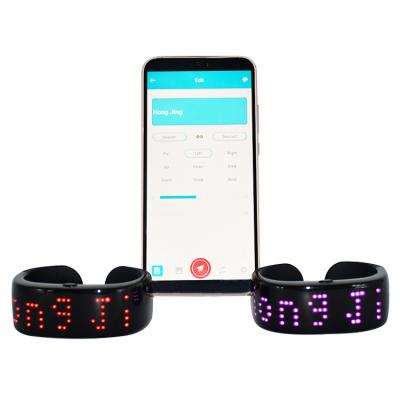 China Newest TPU+ABS+PC 2022 Led Magic Wristband Model Scrolling APP Smart Display Wristband Party Light Up Wristband for sale