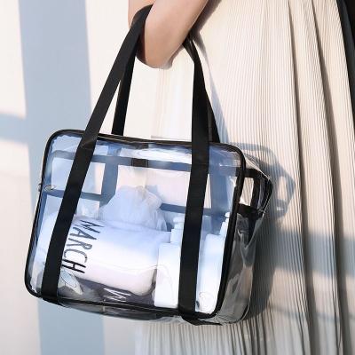 China Large Capacity Clear Rope Handle PVC Men Tote Bag Waterproof Women Travel To Wash Cosmetic Bags for sale