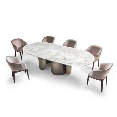 China Modern luxury quality natural marble dining table set round 304 stainless steel dining table in luxury dining room for sale