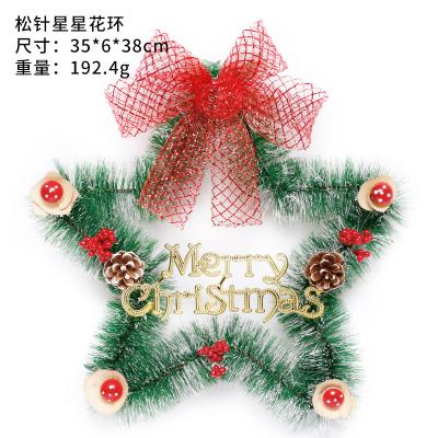 China Christamas home decor poinsettia and pinecone and berry for main entrance decor Christmas wreath for sale