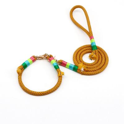 China Personalized Yellow Metal Strong Buckle Braided Dog Leash Suitable for Small and Medium Dogs Hand Braided Pet Leash for sale