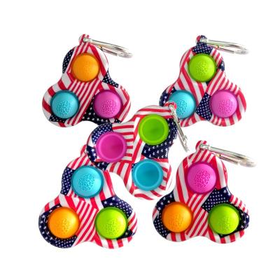 China 2021 new arrival mini push wooden colorful handheld children's noise educational 3d puzzle toys dample toy dampple toy chain head simple buttons for sale