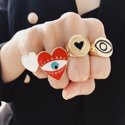 China Trendy Red Color Big Eye Heart Shaped Rings For Women Party Love Heart Eye Rings for sale