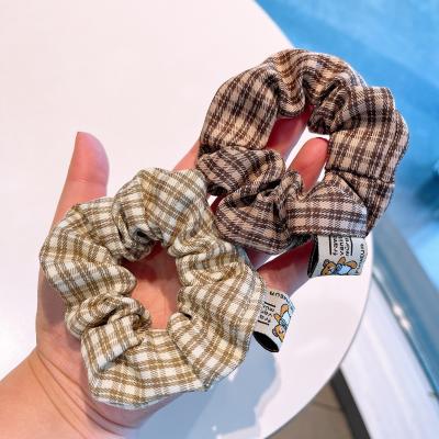 China Fashion autumn college style child hair scrunchies girl hair rope fabric art hair scrunchies for sale