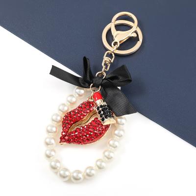 China Luxury Korean Alloy Diamond Lipstick Lips Bead Key Chain Female Key Ring For Car Girl Rhinestone Key Chain for sale