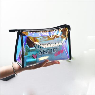 China New Arrival PVC Waterproof Iridescent Makeup Bag Waterproof Toiletry Bag Transparent Logo Printed Laser Vinyl Cosmetic Bag for sale