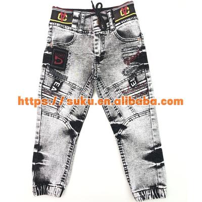 China Breathable Warm Mockup Kids Clothing Splicing Jeans Washed Pants Kids Boys Jeans for sale