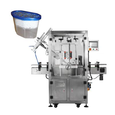 China Plastic Instant Cap Machine Plastic Cap Food Box Lid Automatic Dehydration Capping Capper for sale