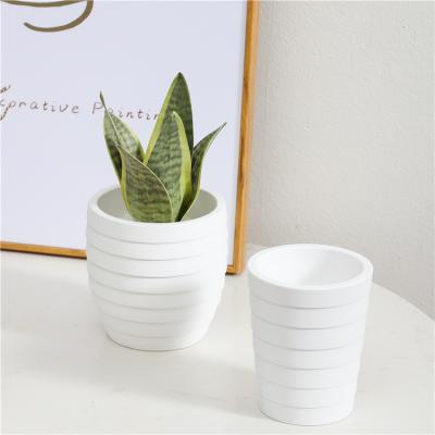 China Modern creative unique design indoor white concrete flower pots cement garden cheap pot for planter for sale