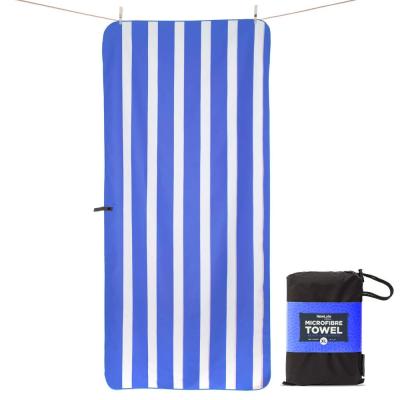 China Compressed Microfiber Beach Towel Quick Dry Bath Towel With Hanging Tag for sale