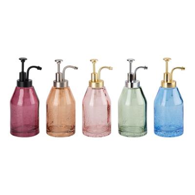 China Round Glass Bath Soap Dispenser Crackle Pattern Shower Gel Dispensers With Apothecary Pump Head for sale