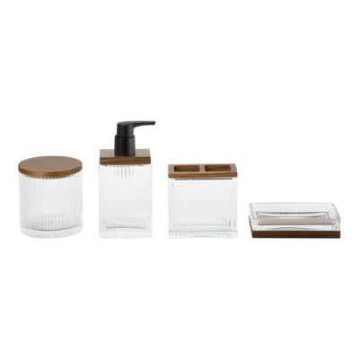 China Accesorios de baño de vidrio conjunto de bomba de madera con nervadura de banda vertical dispensador de jabón tumbler en venta