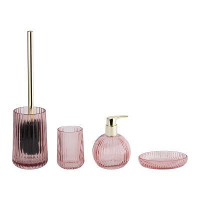 China Conjuntos de baño de vidrio rosa con forma de calabaza con franja vertical Dispensador de loción de vidrio botella Accesorios de escritorio de baño en venta