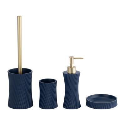 China Polyresin bath accessories sets swirl shape with sand color hand soap bottle toilet brush holder modern bath accessories polyresin soap dispenser for sale