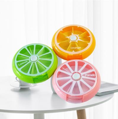 China PP Shape Rotatable Round 7 Slice Fruit Pill Case Weekly Organizer for sale