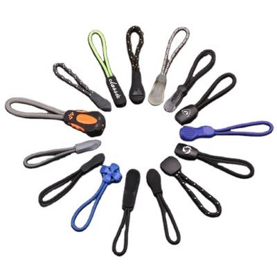 China Bags Soft Plastic PVC Zipper Puller For Bags PVC Zipper Pulling for sale