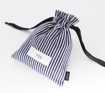 China Recycled Travel Bag Zero Waste Product Small Candy Pouch Cotton Drawstring Stripe Canvas Bag For Promotion for sale