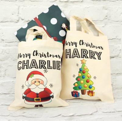 China Wholesale Price Eco Friendly Customized Folding Logo Christmas Drawstring Bag for sale