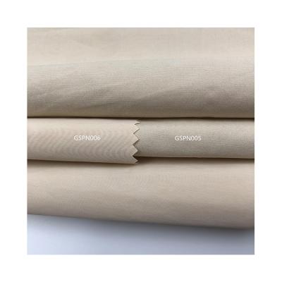 China Waterproof Kam Cotton Goose 80%Polyester+20%Nylon Tan Through Swimwear 4 Way Stretch Knitted Fabric for sale