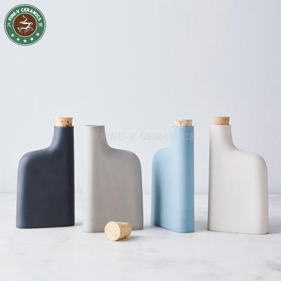 China Unique Matte Porcelain Hip Ceramic Flask With Cork Stopper For Wine Serving Food FVAM21070636 for sale