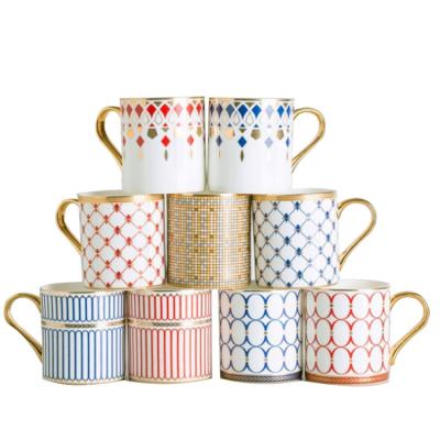 China 2021 New Design Bone China Cup Gold Handle Viable Nordic Style Pure Light European Soft Bone China Ceramic Mugs for sale