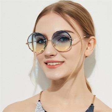 China Colorful Fashion Sunglasses Round Frame Luxury Metal Gradient Sun Glasses AC Frame Ladies Rimless Sun Glasses gafas de sol w8905 for sale