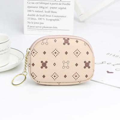 China Mini Single Key Chain Purse Coin Purse Fully Protective / Eco-friendly Dual PU Leather Material Zipper for sale