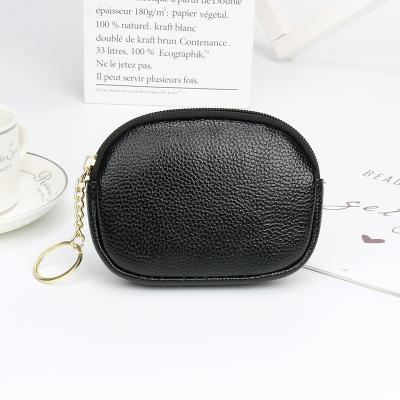 China Fully Protective / Eco-Friendly Custom Waterproof Durable Women PU Leather Mini Wallet Zip Coin Purse With Key Ring for sale