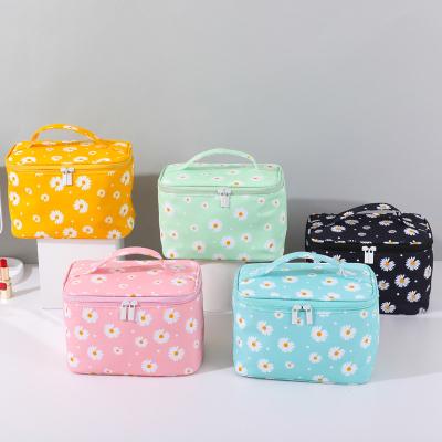 China Large capacity printing new female cosmetic bag Cute multifunctional rectangular nylon portable bag Fully protective/Eco-friendly toiletry bag for sale