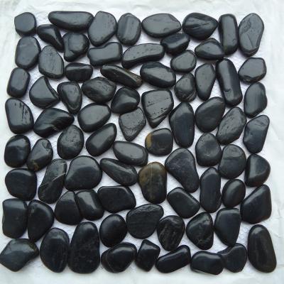 China Decorative Black Parquet A+ Grade Garden Pebble Stones Slab For Wholesale for sale