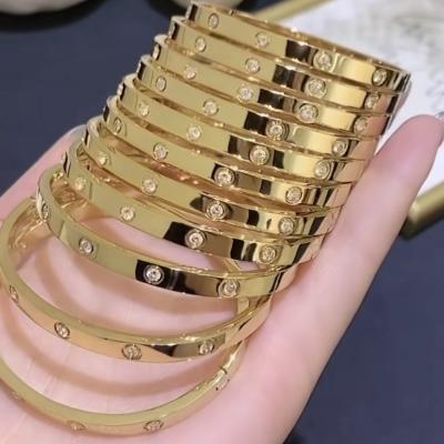 China Vintage Net Celebrity Hot Sale Ten K Drill Gold Bangle Tisco Anti Allergy Not Fading Oval Half Color Buckle Hand String for sale