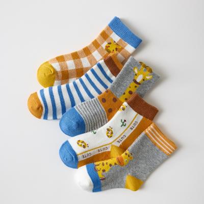 China Wholesale Children's Breathable Socks For Autumn And Winter New Cartoon Giraffe Baby Bumps Plaid Casual Cute Cotton Medium Tube Socks for sale