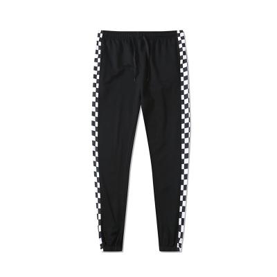 China Anti-Wrinkle Black White Gray Printed Activewear Jogger Track Checkerboard Men Sport Pants for sale