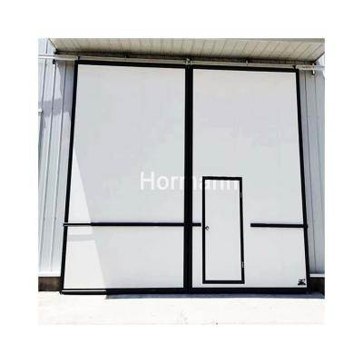 China Windproof automatic industrial flat doors for modern simple warehouses and factories for sale