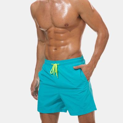 China Quite Dry and Breathe Mens Beach Pants Quick-Drying Pants Mens Quarter Shorts Breathable Waterproof Sports Casual Pants for sale