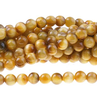 China Smooth GOLD Pleochroic / Natural Round TIGER EYE Pleochroism Beads for sale