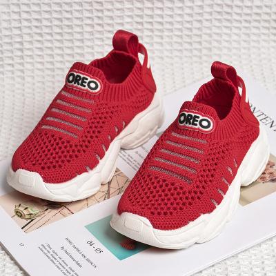 China Breathable Kids Mesh Knitting Outdoor Sports Sneakers Wholesale Kids Round Slip On Sports Shoes for sale