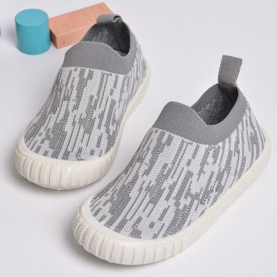 China Spring 2022 New Children's Shoes Breathable Soft Sole Flight Woven Upper Injection Molding Leisure for sale