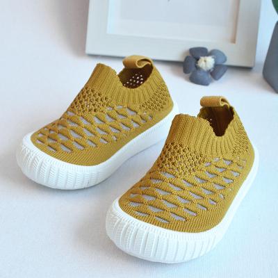 China Breathable Fly Knitted Top Wholesale Kids Shoes Solid Colors Daily Kids Casual Shoes for sale