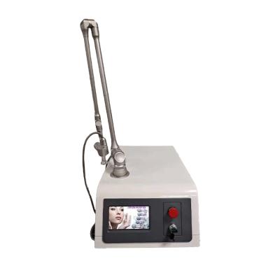 China Portable Fractional Pigment Removal Wholesale CO2 Laser Wart Removal Machine for Fine Lines and Dull Skin for sale