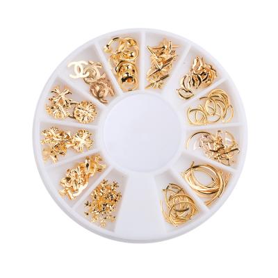 China Easy Apply Metal Nail Art Decoration 2019 Mix Gold Cheap Rivets In Wheel Box For Nails for sale