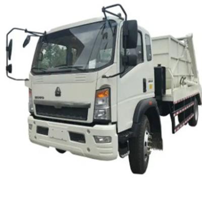 中国 SINOTRUCK HOWO 4x2 6x4 LHD 24m3 水力ロールオフ ゴミ箱 トラック 自動積載 拒否 トラック コンパクター 販売のため