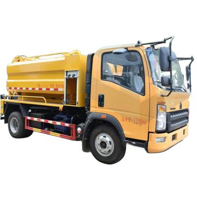 Chine Sinotruk 2-4cbm Lavabo haute pression égout nettoyeur d'eaux usées véhicule de rinçage aspirateur d'eaux usées camion de boues fécales à vendre