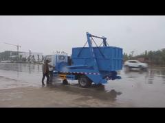 HOWO 4X2 Swing Arm Garbage Collection Truck Skip Loader Truck