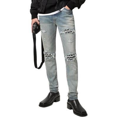 China Jeans For Men OEM Custom Cotton Light Blue Distressed Effect Ripped Denim Pants Slim Fit Ripped-Effect Skinny Jeans For Men for sale