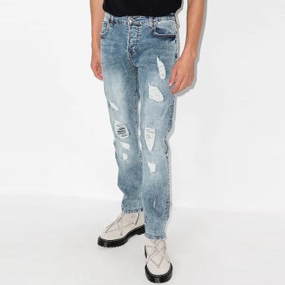 China Jeans for men OEM custom stretch light blue denim distressed effect ripped slim fit tapered jeans for men for sale