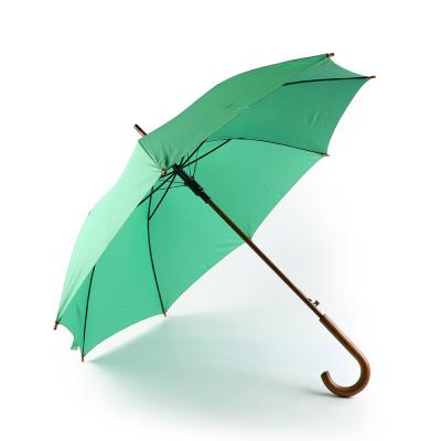 China Quality assurance custom logo multiple color solid windproof straight umbrella with j wooden handle for sale