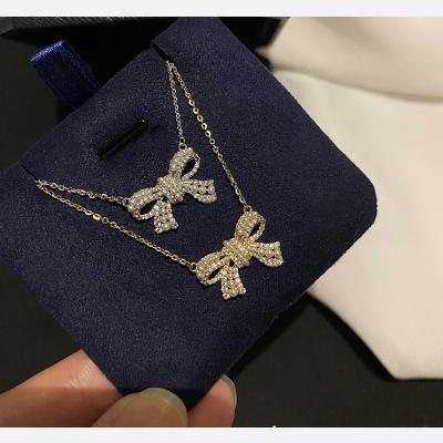 China Pure Silver Cubic Zircon Arc Shape 2023 Gold Plating Pearl Bowknot Lead Free Nickel Free Elegant Pendant Necklace for sale