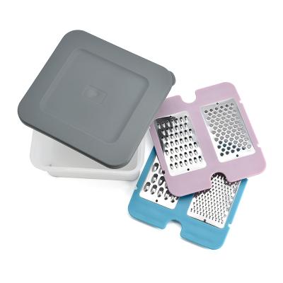 China Multifunctional veggie grater stainless steel grater box 4-in-1 stocked vegetable slicer for sale